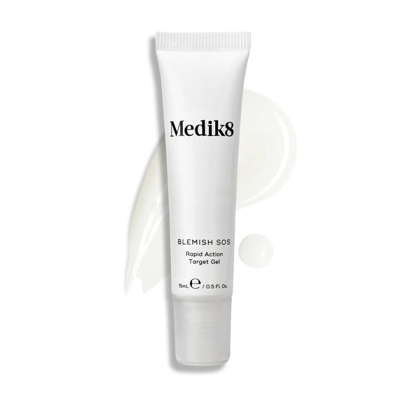 A tube of Blemish SOS stands upright, with a wavy swatch of light-colored gel and a droplet beside it.-5
