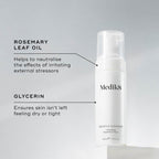 A Medik8 Gentle Cleanse bottle displayed on a white block. Lines connect the bottle to text explaining key ingredients: "Rosemary Leaf Oil" to neutralise the effects of irritating external stressors and "Glycerin" to ensure skin isn't left feeling dry or tight.