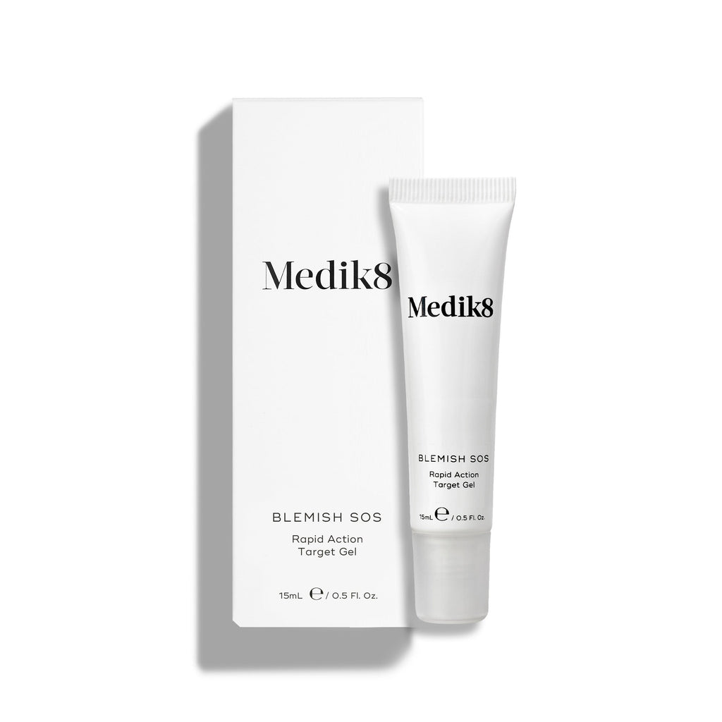A white tube of Blemish SOS (15mL) stands beside its white carton.