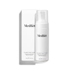Medik8 Clarifying Foam pump bottle stands next to its matching white outer carton on a clean white background. Text on both identifies the product as a 150mL Refreshing AHA/BHA Blemish Cleanser.