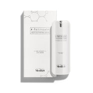 A white pump bottle of r-Retinoate Day & Night Eye Serum stands beside its matching white carton. 