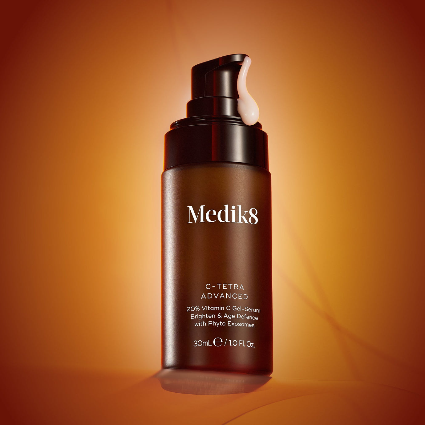 c-tetra advanced on an orange background with the serum coming out of the pump