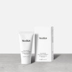 A small white tube of Calmwise Colour Correct (15mL) stands beside its white carton