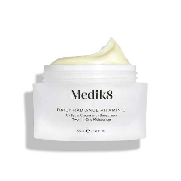 Medik8 Daily Radiance Vitamin C cream jar is shown open with a generous peak of pale yellow cream on top. Text identifies the product as a 50mL C-Tetra Cream Two-in-One Moisturiser.-3