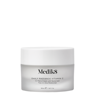 a jar of travel sized radiance vitamine c cream displayed in front of carton product texture shown