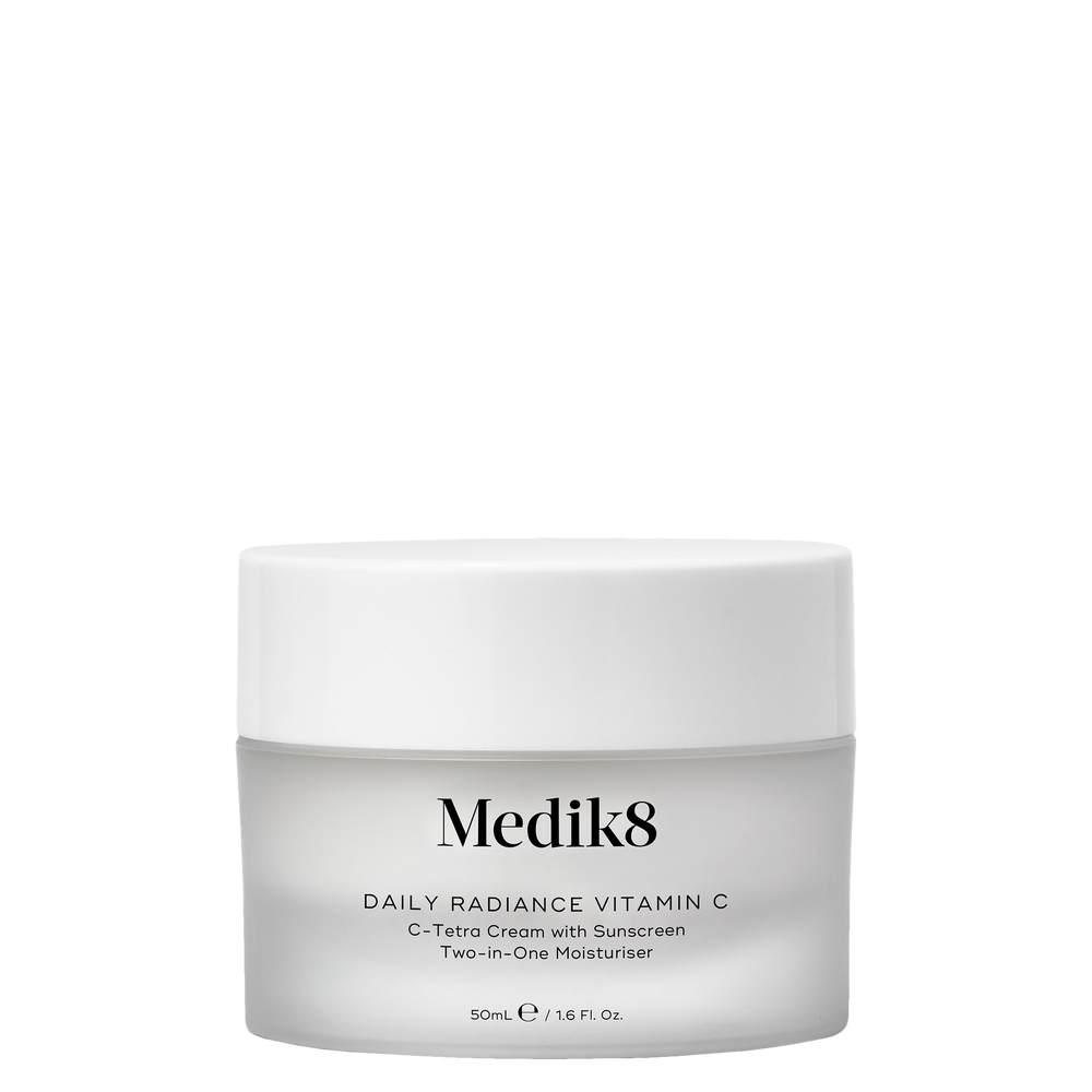 a jar of travel sized radiance vitamine c cream displayed in front of carton product texture shown