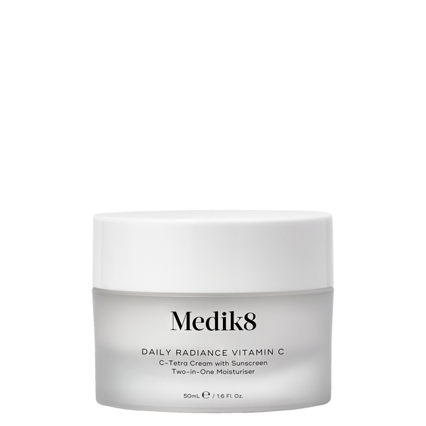 a jar of travel sized radiance vitamine c cream displayed in front of carton product texture shown