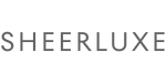 The Sheerluxe logo, featuring the word "SHEERLUXE" in all-caps using a clean, modern, dark grey sans-serif typeface with wide spacing between the letters, centered on a white background.