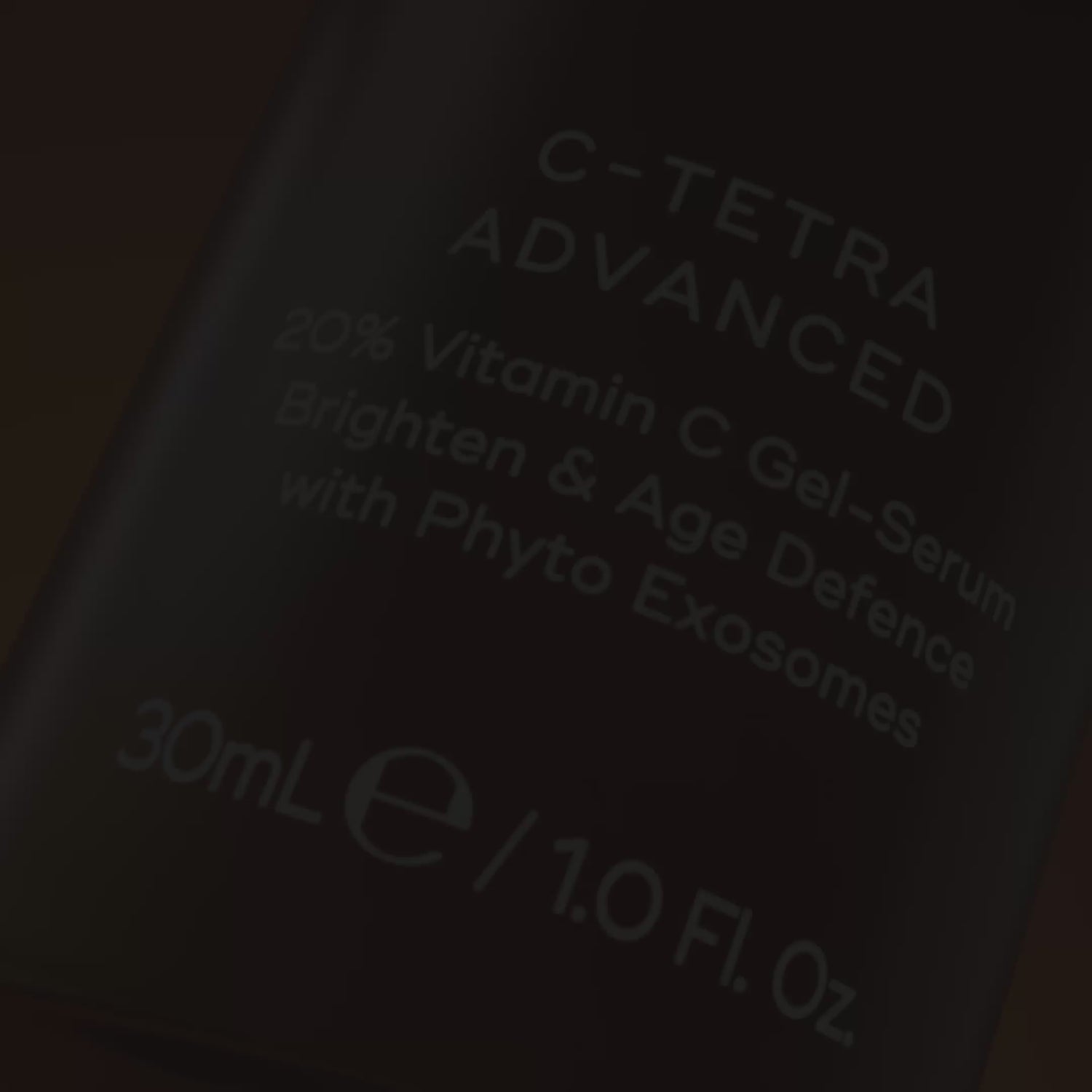 A video for Medik8 C-Tetra Advanced opens with a close-up of the bottle's label, then shows a woman applying the product to her cheek. A split-screen before-and-after image of a woman's cheek demonstrates how the product can "VISIBLY BRIGHTEN SKIN & REDUCE WRINKLES" after 4 weeks. The video then highlights key ingredients: "20% VITAMIN C" and "PHYTO EXOSOMES" with "0% DISRUPTION TO SKIN BARRIER*". It concludes with a shot of the product alongside the Medik8 logo and a "Certified B Corporation" badge.
